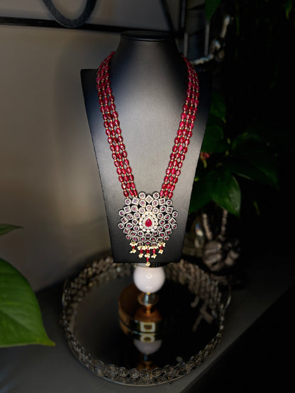 adau long necklace, Semi-precious stones, Kundan, Kemp stones, Pearls, Indian traditional jewelry, Heavy necklace, Regal charm, Impeccable craftsmanship, Special occasion, Grand celebration, Statement jewelry.