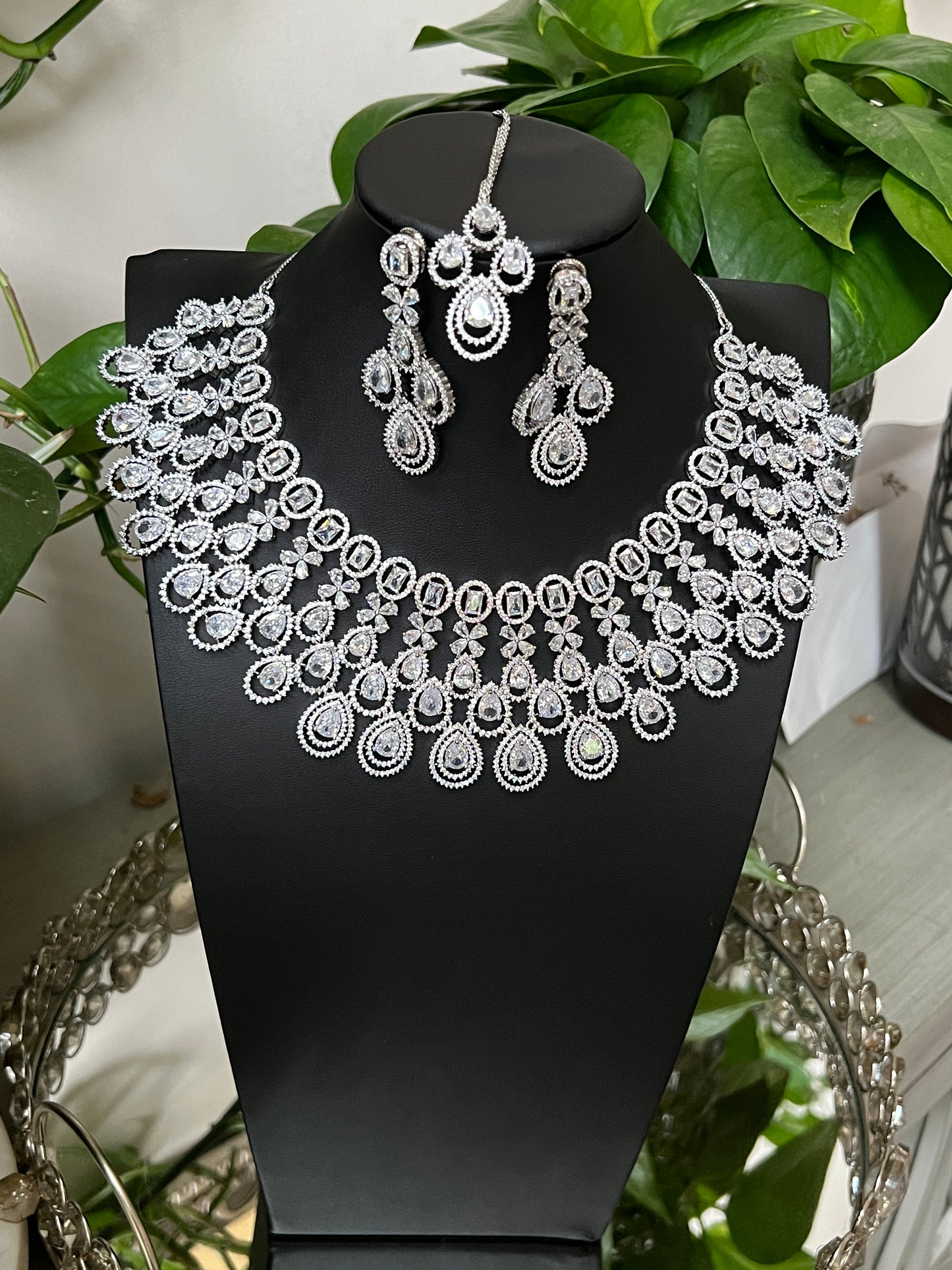 Bridal jewelry set AD necklace and earrings Diamond look alike jewelry High-end statement necklace Pastel pink stones Dangler earrings Mang tikka set Complete bridal look Wedding jewelry Indian bridal jewelry Artificial jewelry Fashion jewelry Costume jewelry AD bridal set Bridal accessories