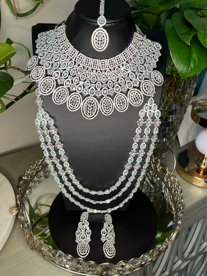 Bridal jewelry set AD necklace and earrings Diamond look alike jewelry High-end statement necklace Pastel pink stones Dangler earrings Mang tikka set Complete bridal look Wedding jewelry Indian bridal jewelry Artificial jewelry Fashion jewelry Costume jewelry AD bridal set Bridal accessories