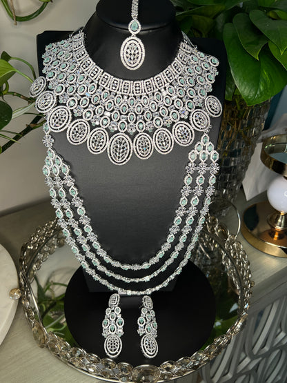 Bridal jewelry set AD necklace and earrings Diamond look alike jewelry High-end statement necklace Pastel pink stones Dangler earrings Mang tikka set Complete bridal look Wedding jewelry Indian bridal jewelry Artificial jewelry Fashion jewelry Costume jewelry AD bridal set Bridal accessories