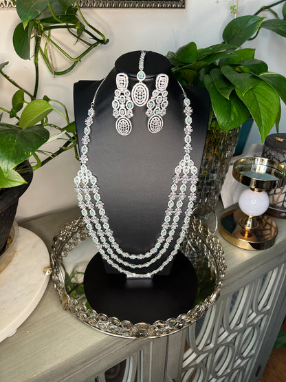 Bridal jewelry set AD necklace and earrings Diamond look alike jewelry High-end statement necklace Pastel pink stones Dangler earrings Mang tikka set Complete bridal look Wedding jewelry Indian bridal jewelry Artificial jewelry Fashion jewelry Costume jewelry AD bridal set Bridal accessories